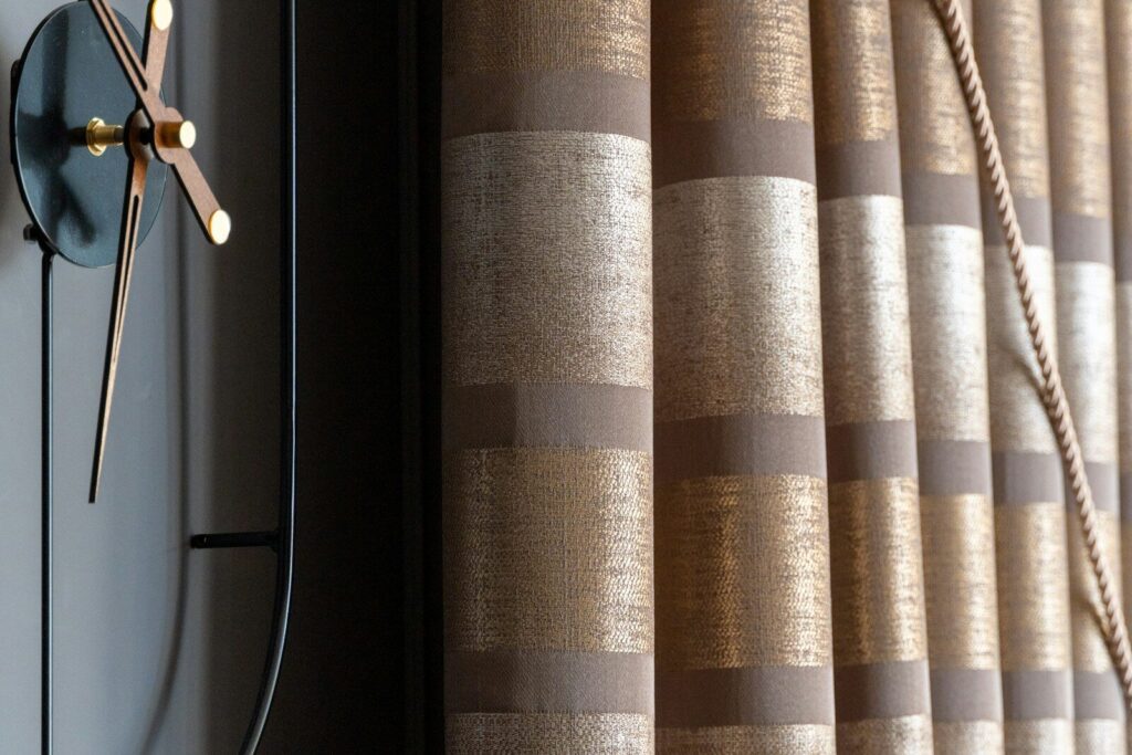 a clock that is on the side of a wall