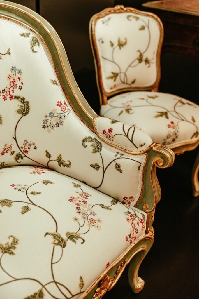 A set of chairs with floral designs on them