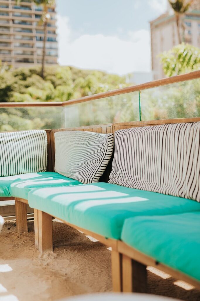 a deck with chairs and a table